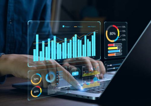 Businessman works on laptop Showing business analytics dashboard with charts, metrics, and KPI to analyze performance and create insight reports for operations management. Data analysis concept.Ai